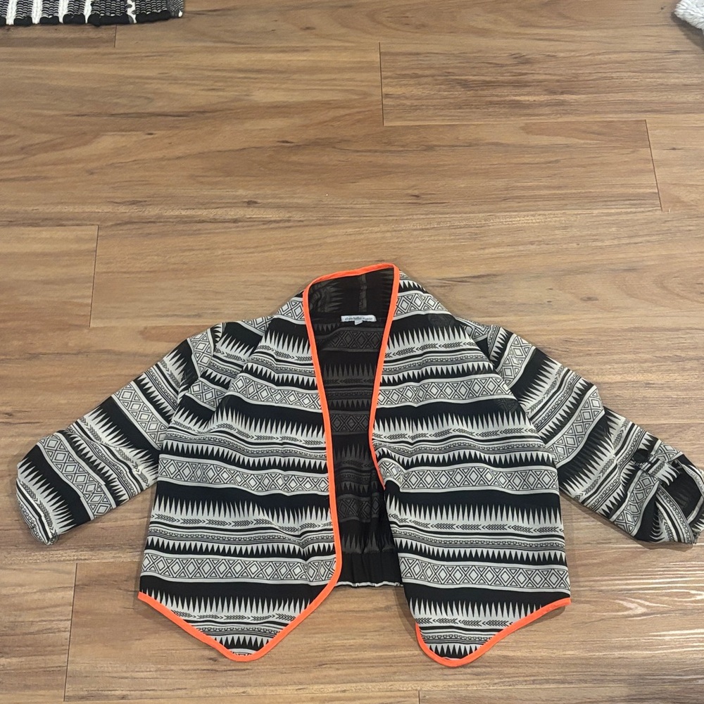 Black & White Patterned Jacket with Orange Trim